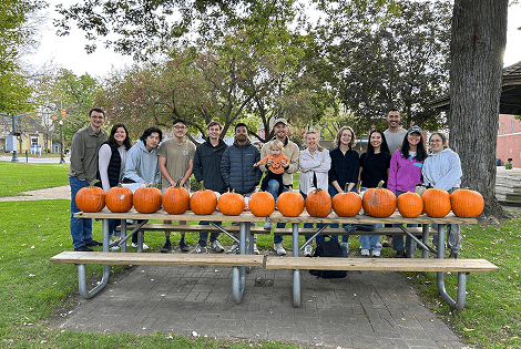 Redeemer Ann Arbor campus ministry group painting pumpkins